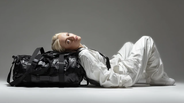 Model with Duffle Bag Modern Photography