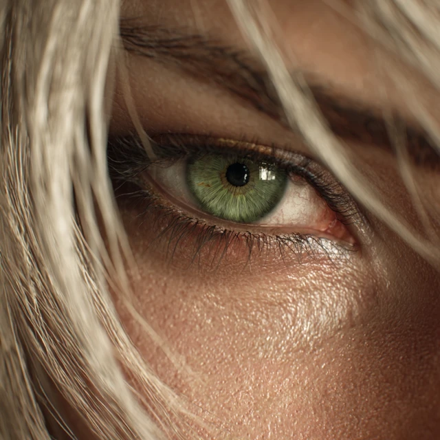 CloseUp of Female Eye with Golden Light and Blonde Hair