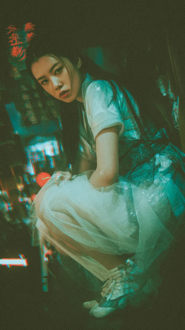 Asian Woman in Retro Chinese Costume Downtown