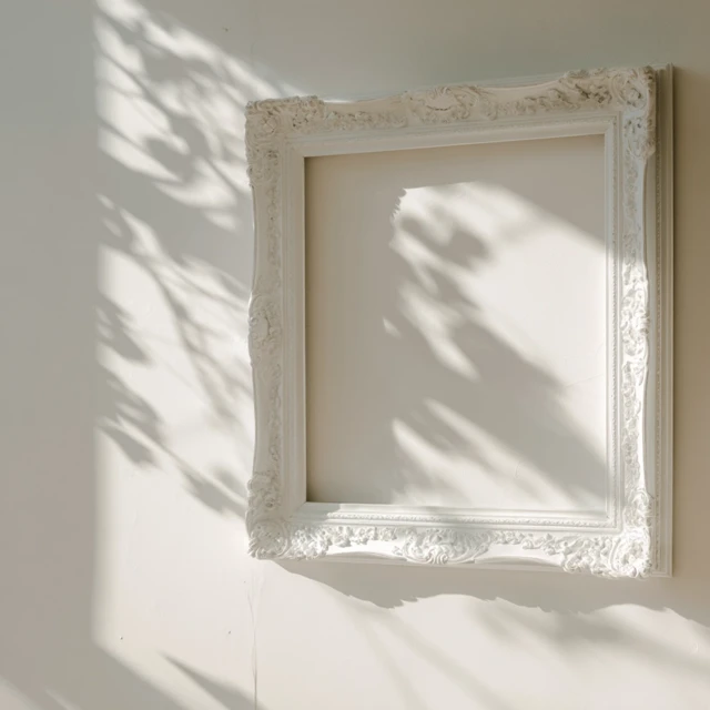 Baroque Picture Frame on Wall with Botanical Shadows