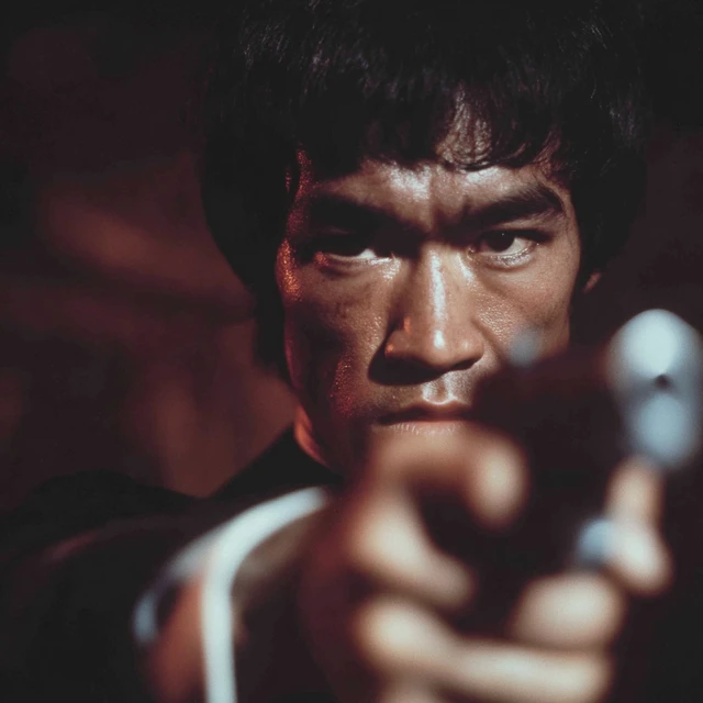 Bruce Lee Pointing Gun Dramatic Portrait