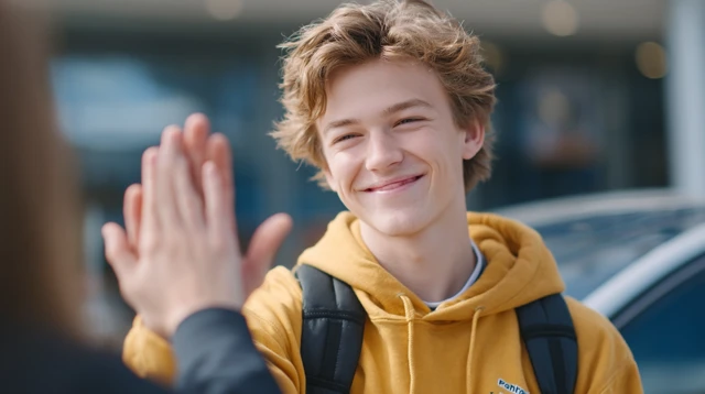 Student Celebrates Test Success Thumbs Up