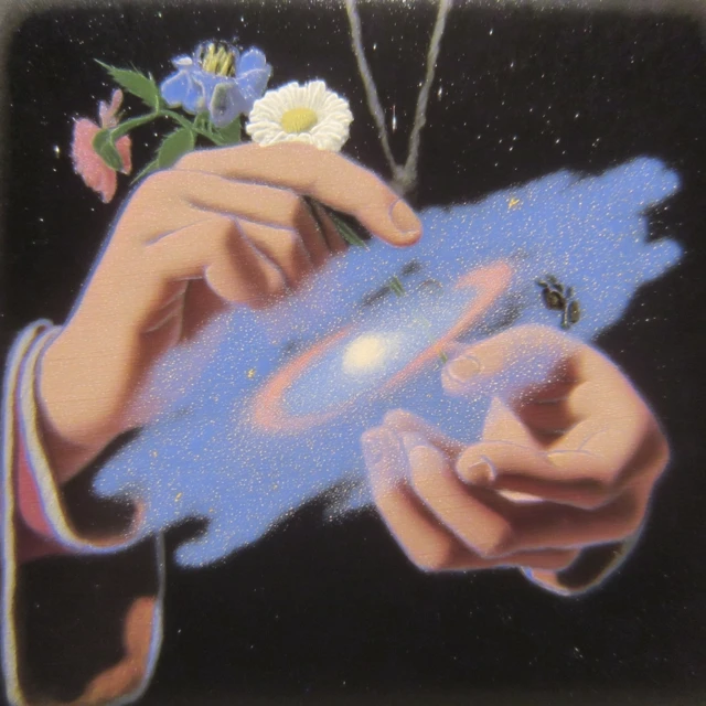 Hands Holding Galaxy Art in Pastel Colors
