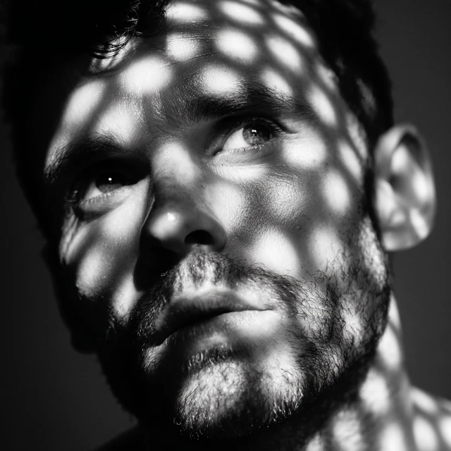 Contemplative Man in Black and White Portrait