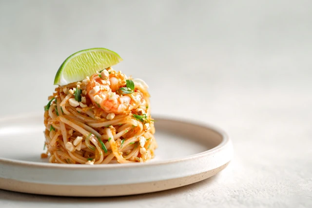 Delicious Pad Thai Noodles with Shrimp Peanuts and Lime