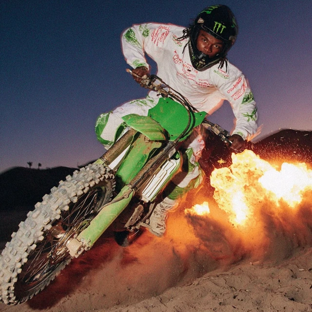 Motocross Rider in Action with Explosive Energy