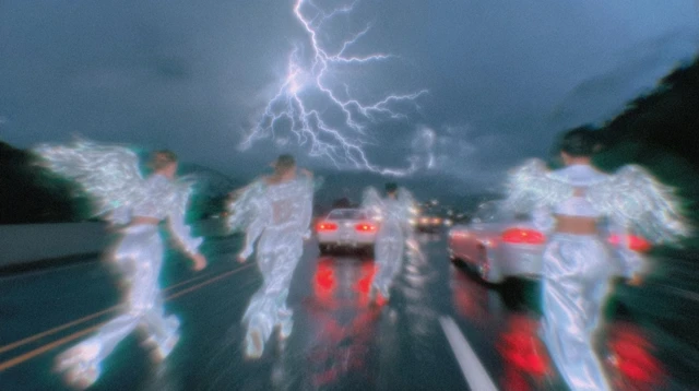 Angels Running on a Rainy Highway at Night