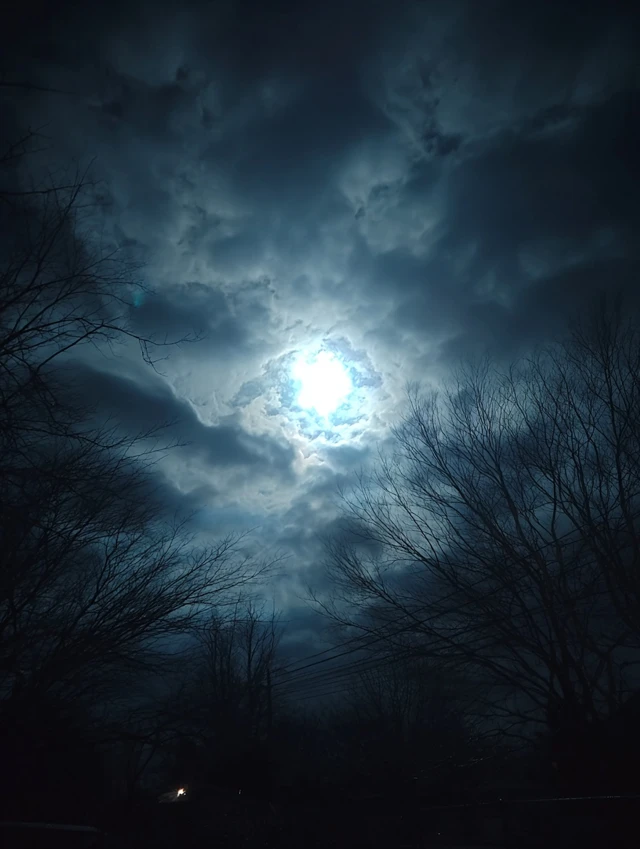 Eerie Moon in Black Sky Horror Scene