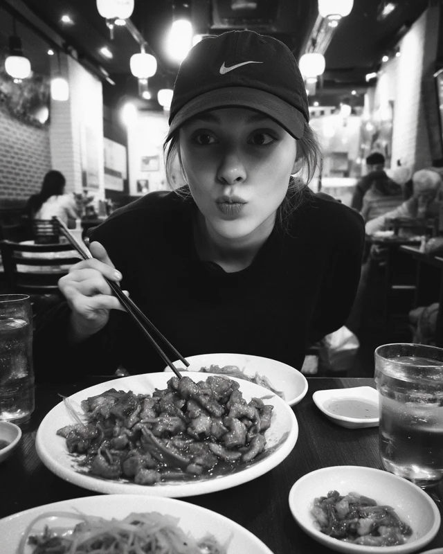 Young Woman Eating Korean Food Candid Photo