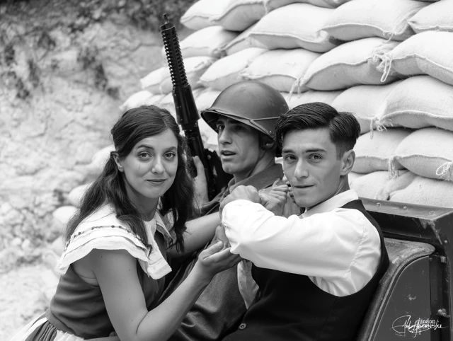 WWII Civilians Smiling Black and White Photo