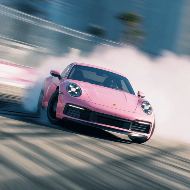Pink Porsche Drifting Sideways at High Speed