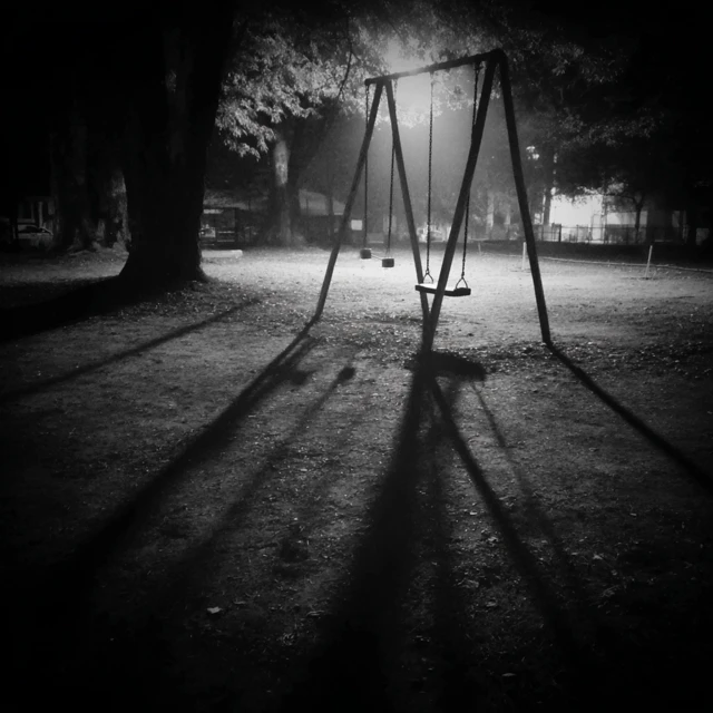 Abandoned Playground at Night Horror Photo
