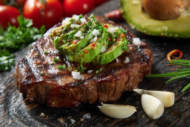 Grilled Beef Steak with Avocado and Garlic
