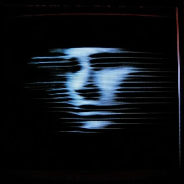 Abstract album art with a ghostly face