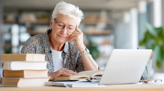 Elderly Woman Studying Learning at Home