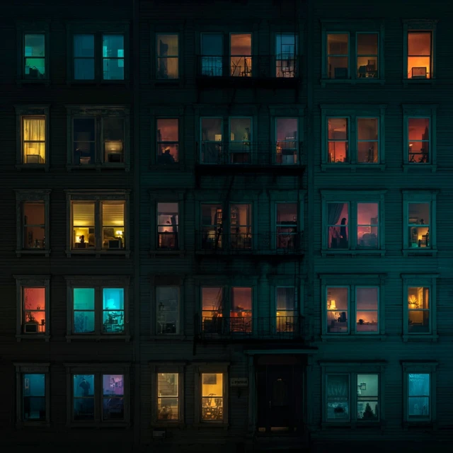Apartment Facade Night View with Stories in Each Window