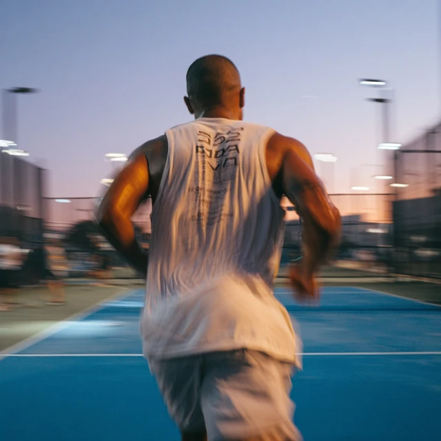 Athlete Sprinting Pickleball Court Training Session