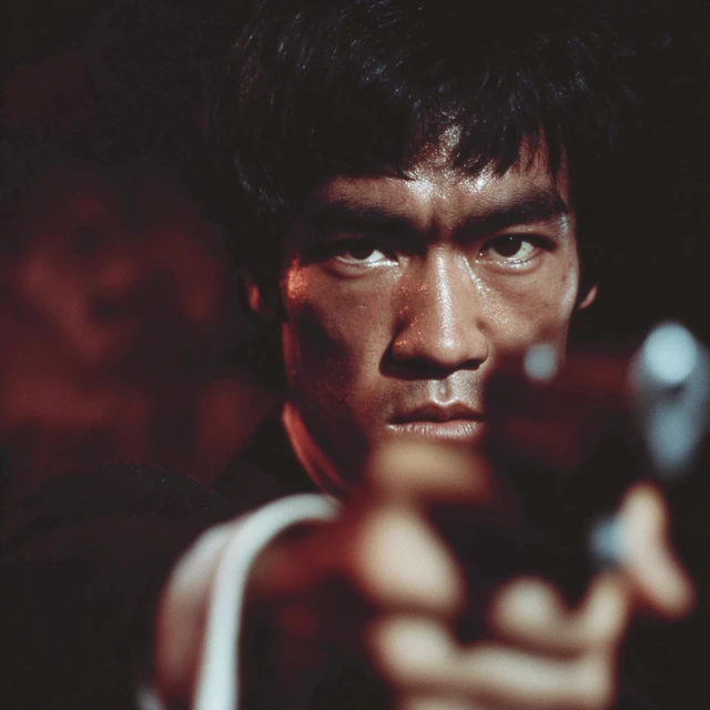 Bruce Lee Pointing Gun Dramatic Portrait