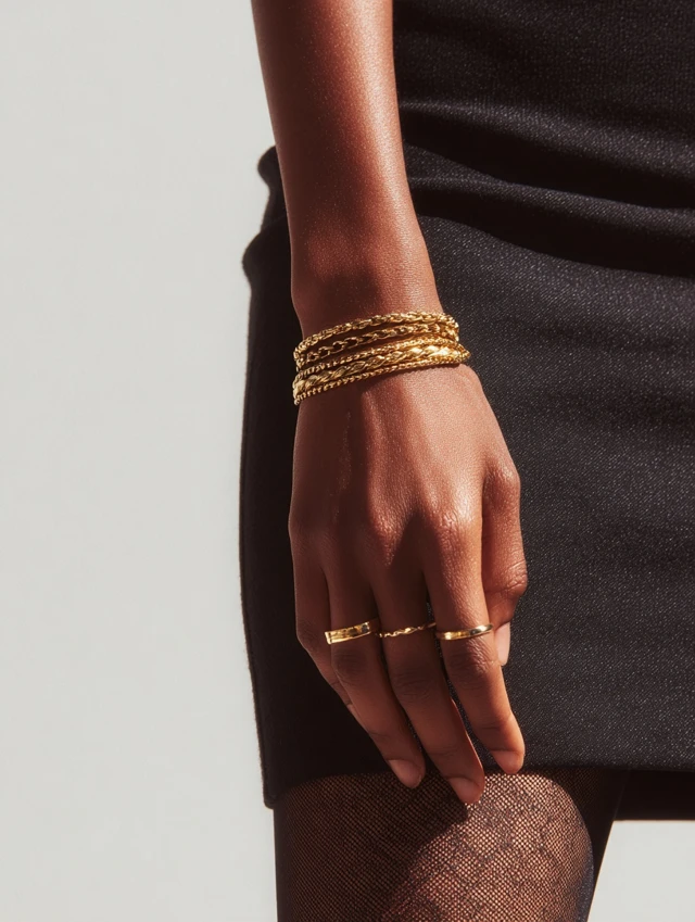 African American Model Hand with Gold Jewelry